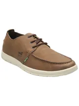 Zapato náutico casual de cuero azul marino con cordones, suela de goma color crema y plantilla calada.
