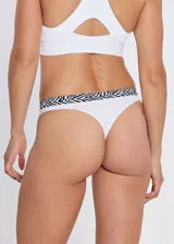 Pack de tres bombachas cola less de microfibra sin costuras, con fundillo de algodón. Incluye bombachas en color negro, gris y blanco, con cintura elástica estampada con diseño de cebra.