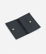 Cartera pequeña porta tarjeta color negro con textura. Marca Satinato.