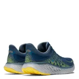 Championes de running New Balance Fresh Foam 1080 V12, color azul con detalles en amarillo y gris.