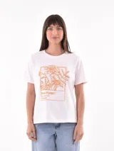 Remera blanca de algodón con estampado de limones y texto en azul.