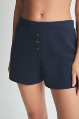 Short azul de morley pesado con cintura elastizada y cartera falsa con botones.