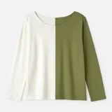 Blusa de mangas largas, con corte holgado y escote redondo. Presenta un diseño color block, con la mitad izquierda en color blanco y la mitad derecha en color verde oliva.