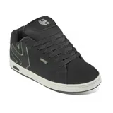 Championes Etnies Fader negros con logo verde en el lateral y suela blanca.