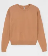 Buzo de punto negro de algodón, con cuello redondo y mangas largas.