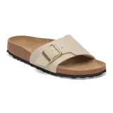 Sandalias Birkenstock modelo Catalina BF, color beige claro, con una única correa ancha ajustable con hebilla dorada y suela de corcho.
