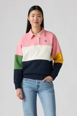 Sweater de cuello polo con botones, mangas largas y diseño color block en tonos rosa, blanco, verde, azul marino y amarillo.