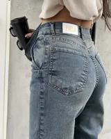 Pantalón de jean azul elastizado de tiro alto.