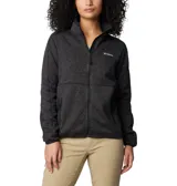 Campera polar Columbia Sweater Weather con cierre frontal completo, confeccionada en tejido polar tipo jersey color gris jaspeado. Cuenta con cuello alto, bolsillos laterales con cierre y logo de la marca bordado en el pecho.