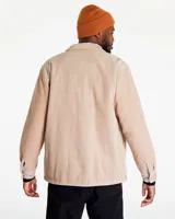Campera tipo camisa de pana negra con dos bolsillos de parche en el pecho y cierre con botones.
