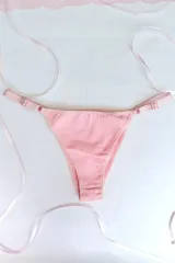 Bombacha de bikini negra de algodón elastizado con tiras elásticas regulables y tiro medio.