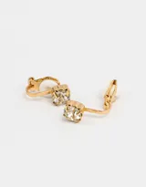 Par de aros dorados con forma del símbolo de venus, con strass incrustado.