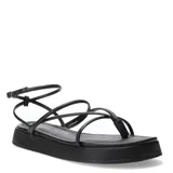 Sandalias negras con plataforma baja y tiras finas.