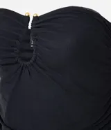 Vestido midi negro sin breteles, confeccionado en tule con ribete en el busto.
