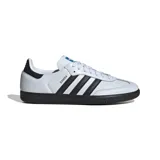 Championes Adidas Samba Og de cuero blanco con detalles en negro y suela de goma color caramelo.