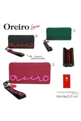 Billetera tipo sobre, color negro, con cierre perimetral rojo y logo de la marca en relieve rojo en el frente. Incluye un llavero de muñequera de tela negra con el logo en rojo.