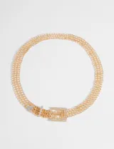 Cinturón de cadena dorado con hebilla decorada con strass.