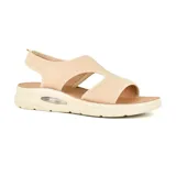 Sandalias color beige con plataforma blanca y suela marrón.