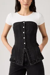 Chaleco negro de jean con corte tipo corset, breteles anchos, cierre frontal con botones y peplum.
