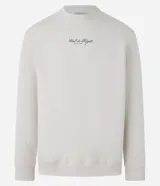 Buzo color crema de algodón y poliéster con cuello redondo, mangas largas y estampa bordada con letras en el pecho.