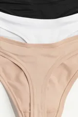Pack de tres bombachas colaless de microfibra en color negro, beige y blanco.