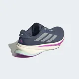Championes de running Adidas Supernova Rise 2, color azul con detalles en plateado, lila y verde agua.