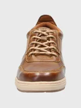 Championes urbanos Hush Puppies modelo Draper, color azul marino, confeccionados en cuero, con cordones grises, plantilla Smart Foam® y suela de goma color beige.