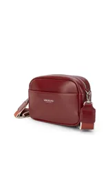 Bandolera color beige con apertura central con cierre, bolsillo frontal con logo "Lincoln's Since 1984" y correa de galón a tono, larga y regulable.