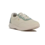 Championes urbanos Comfortflex color beige con detalles en verde agua, cordones blancos y suela clara.