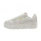 Zapatillas urbanas Puma Carina Street, color crema con detalles en dorado.