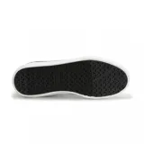 Championes Etnies Blitz de lona azul marino con logo de la marca en el lateral y suela de goma color caramelo.
