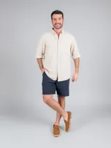 Mocasín gris de descarne con suela de goma y detalle de yute trenzado.
