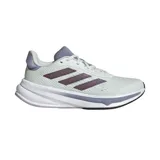 Championes de running Adidas Response Super, color verde claro con detalles en lila y las tres tiras en color borgoña.