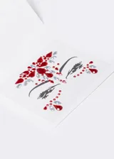 Adhesivos de strass en tonos morados diseñados para decorar el rostro.