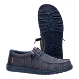 Zapatos Hey Dude Wally Stretch Mesh color azul con textura tejida, cordones elásticos y suela de goma.