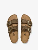 Sandalias Birkenstock Arizona con estampado animal print en tonos marrones y hebillas metálicas ajustables.
