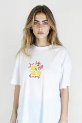 Remera blanca de algodón con estampado de limones y la frase 'When life gives you lemons'.