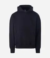 Buzo tipo canguro de color gris melange, con capucha, bolsillo canguro frontal y puños y bajo acanalados. Corte recto.