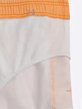 Short de baño azul con estampado de motivos marinos en celeste.