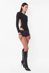 Body negro traslúcido de jersey con mangas largas y espalda descubierta.