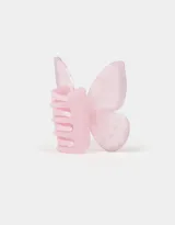 Broche para el pelo color rosa pastel con forma de mariposa.