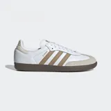 Championes Adidas Samba OG, color blanco con detalles en marrón y suela marrón.