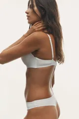 Pack de tres bombachas tipo brazilian de microfibra en colores negro, blanco y gris.