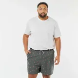 Short de baño gris con estampado de palmeras color naranja.