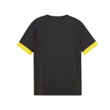 Camiseta de fútbol amarilla de corte clásico, con logo de Puma bordado en negro en el pecho derecho y escudo bordado en el pecho izquierdo.