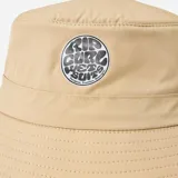 Sombrero tipo bucket Rip Curl Surf Series color beige con logo estampado en el frente y protección para el cuello.