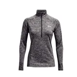 Remera Under Armour Tech de mujer, color gris jaspeado, de manga larga con medio cierre frontal y cuello alto.