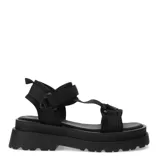 Sandalias de mujer color beige con plataforma plana y tiras de ajuste textil.