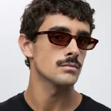 Lentes de sol rectangulares con montura Carey y lentes marrones polarizadas. Ofrecen protección UV400 y están fabricadas con materiales bio-based y propionato de celulosa.