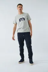 Pantalón de jogging negro de felpa con logo estampado y en goma, bolsillos con cierre, cierres en los tobillos, cintura ajustable y puños.